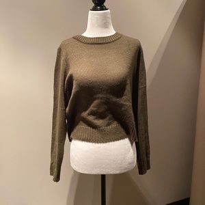 cute dark green sweater suitable for all seasons